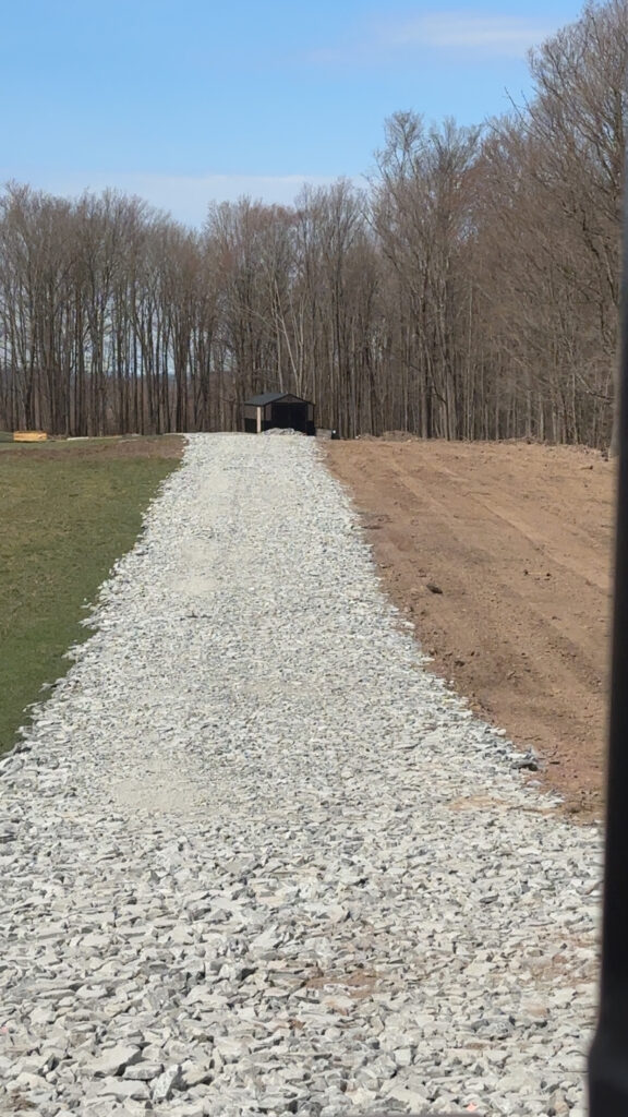 Gravel path leading to a structure