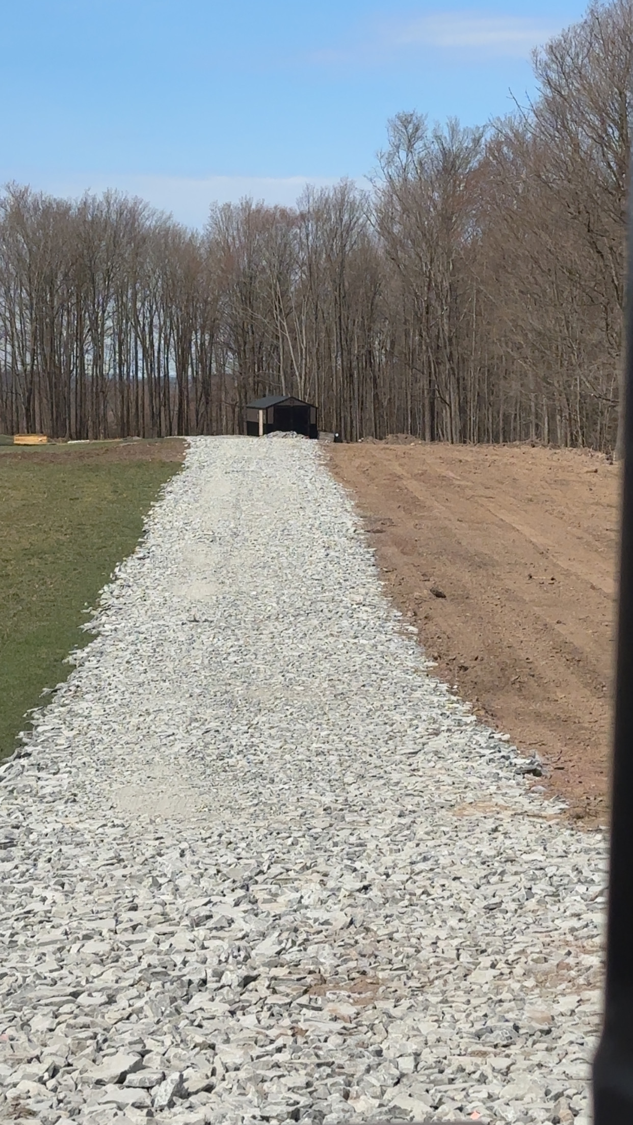 Gravel path leading to a structure